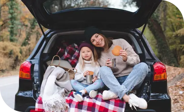 Family picnic in car trunk