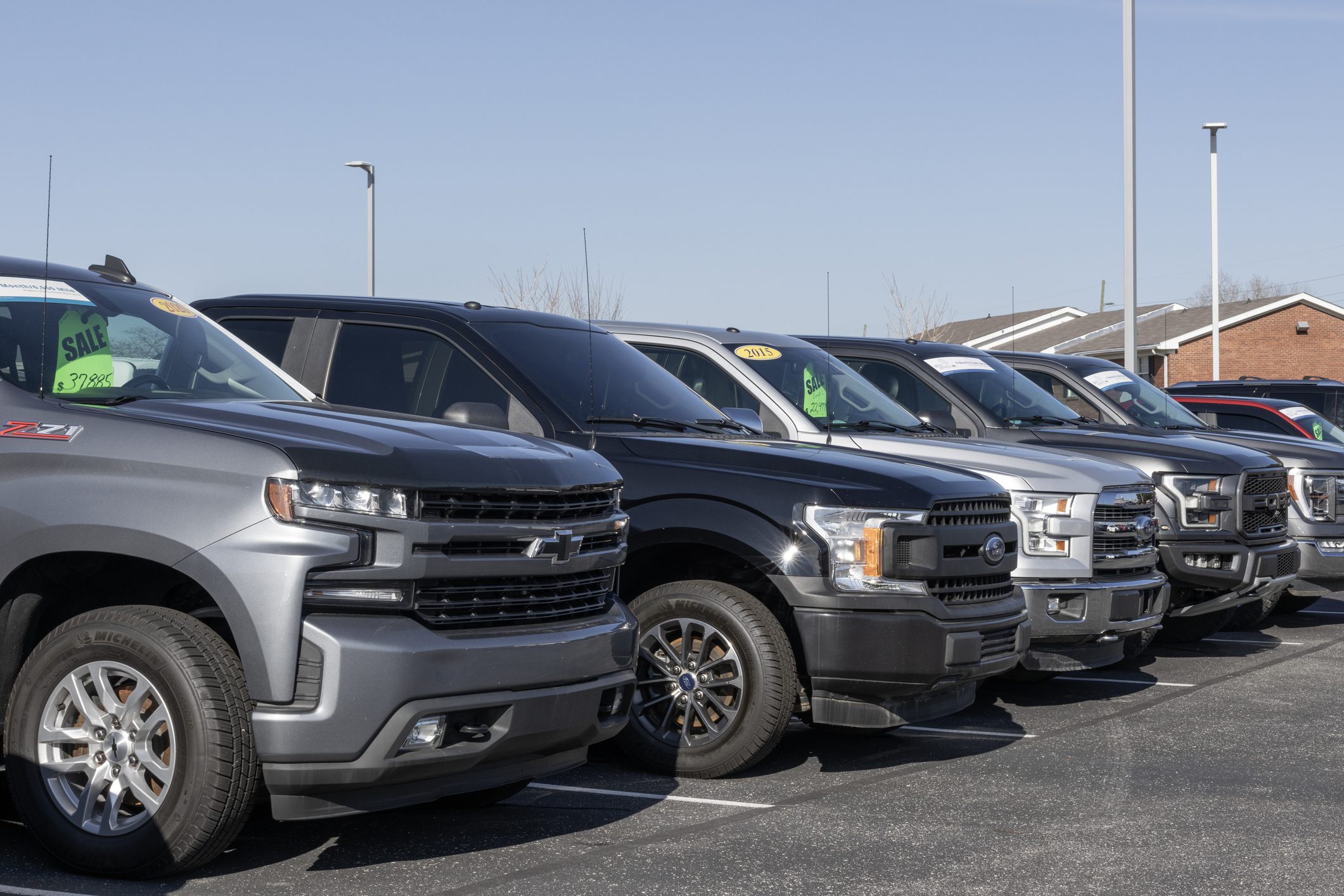 Kokomo - February 4, 2024: Used pickup truck display at a dealership. With supply issues, used and preowned cars are in high demand.